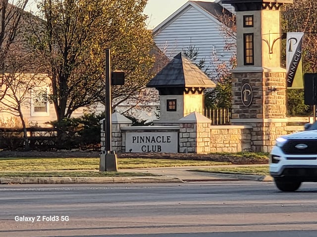 view of community sign