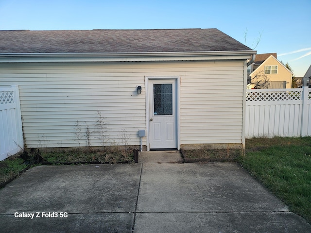 property entrance featuring a patio area