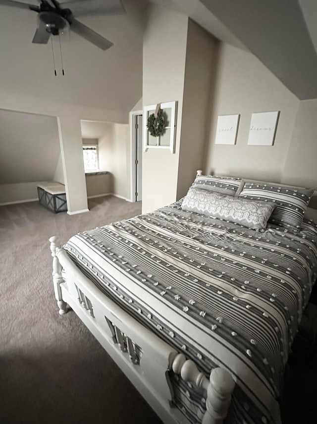 bedroom with carpet, ceiling fan, and vaulted ceiling