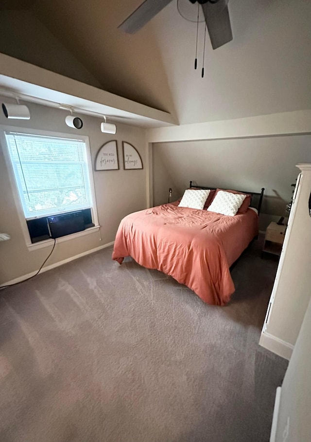 carpeted bedroom with ceiling fan and lofted ceiling