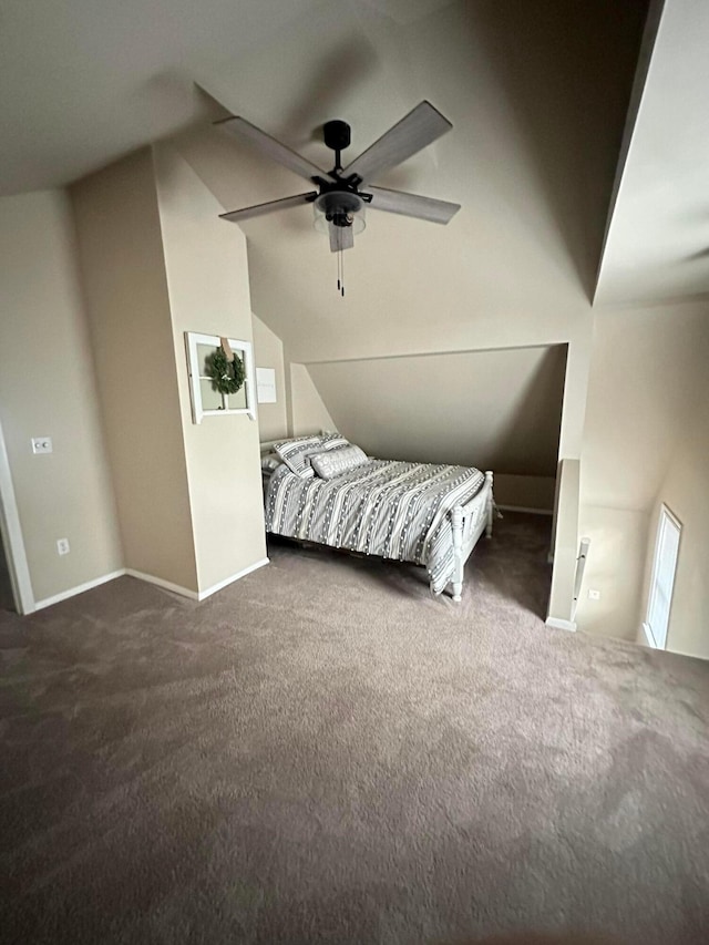 carpeted bedroom featuring ceiling fan and lofted ceiling