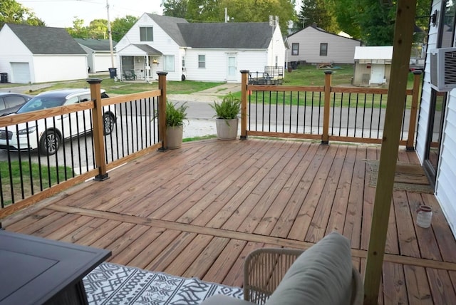 deck featuring a lawn and a porch