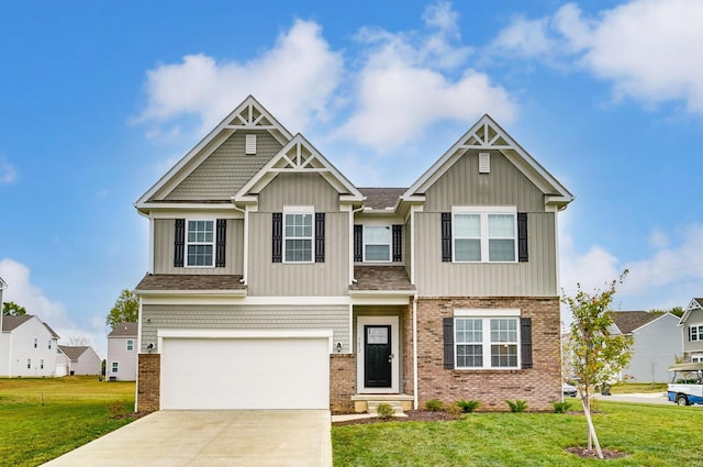 5652 Red Alder St, Groveport, OH 43125 - craftsman inspired home with a front yard, driveway, a garage, and brick siding