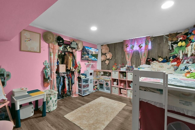 bedroom with wood-type flooring