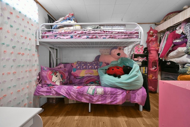 bedroom featuring hardwood / wood-style floors