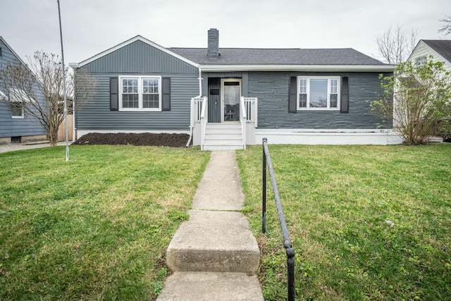 view of front of property with a front lawn