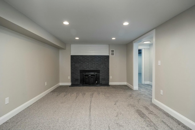 unfurnished living room featuring carpet