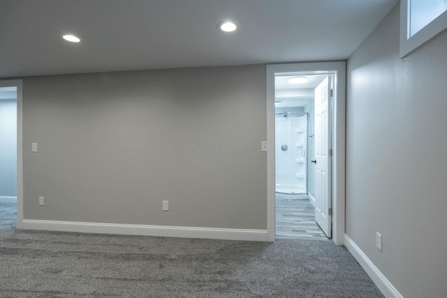 unfurnished room featuring carpet flooring