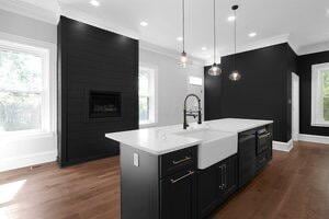 1571 Dyer Rd, Grove City, OH 43123 - kitchen with dark cabinetry, ornamental molding, light countertops, dark wood-style flooring, and recessed lighting