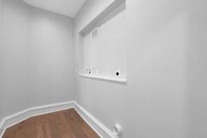 1571 Dyer Rd, Grove City, OH 43123 - laundry area with hookup for an electric dryer and wood finished floors