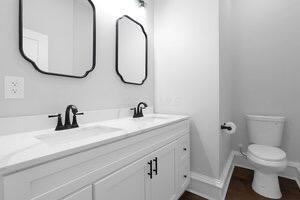 1571 Dyer Rd, Grove City, OH 43123 - bathroom with toilet and double vanity
