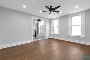 1571 Dyer Rd, Grove City, OH 43123 - unfurnished living room featuring wood finished floors, recessed lighting, and ceiling fan