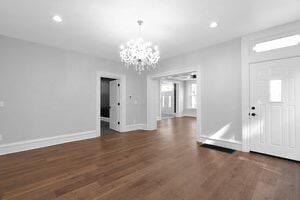 1571 Dyer Rd, Grove City, OH 43123 - foyer entrance with a chandelier, wood finished floors, and recessed lighting