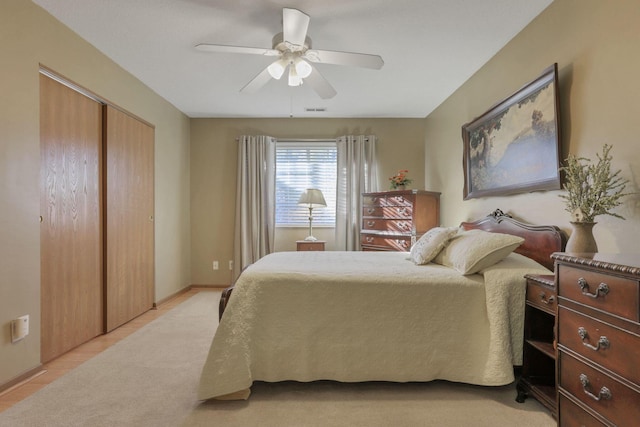 bedroom featuring a closet and ceiling fan