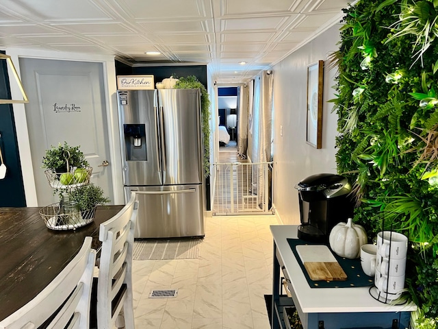 kitchen with stainless steel fridge with ice dispenser