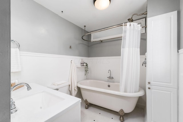 bathroom with tile patterned flooring and sink