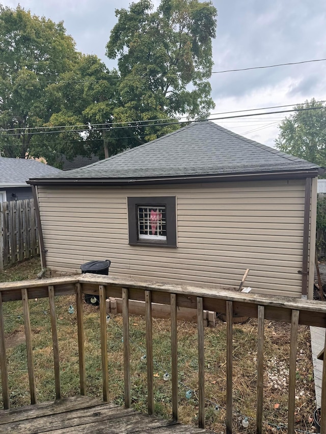 view of side of property featuring a deck