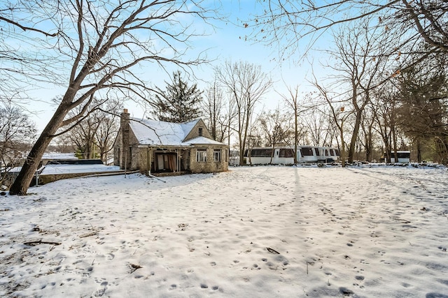 view of yard covered in snow