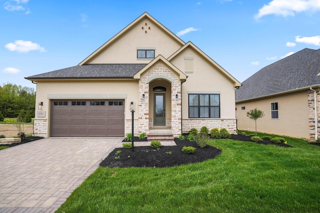 6206 Garden Loop, Westerville, OH 43082 - view of front of property featuring stone siding, stucco siding, and a front lawn