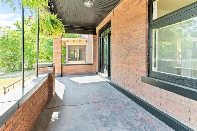 view of patio featuring a porch