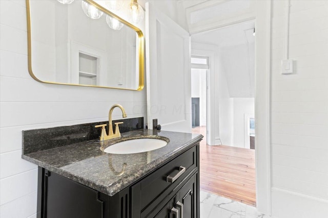 bathroom featuring hardwood / wood-style floors and vanity