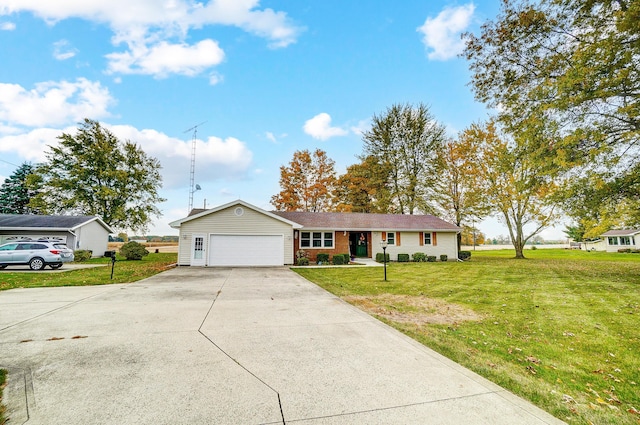 ranch-style home with a garage and a front yard