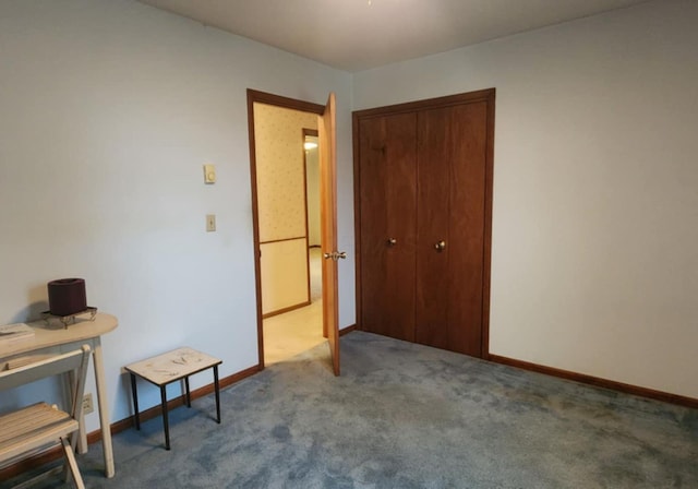 carpeted bedroom with a closet