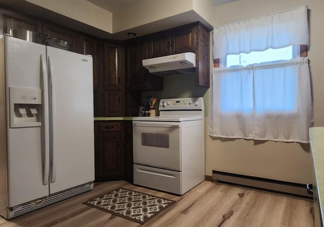 kitchen with dark brown cabinetry, a baseboard heating unit, white appliances, and light hardwood / wood-style floors