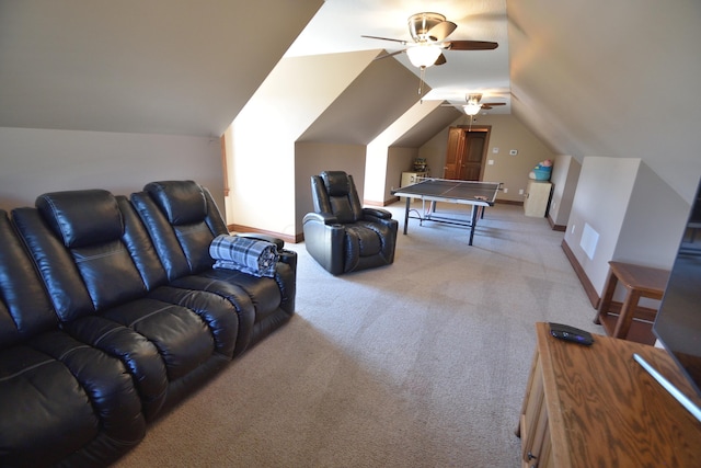 playroom featuring ceiling fan, carpet floors, and lofted ceiling