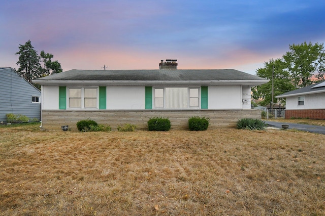 exterior space with a yard