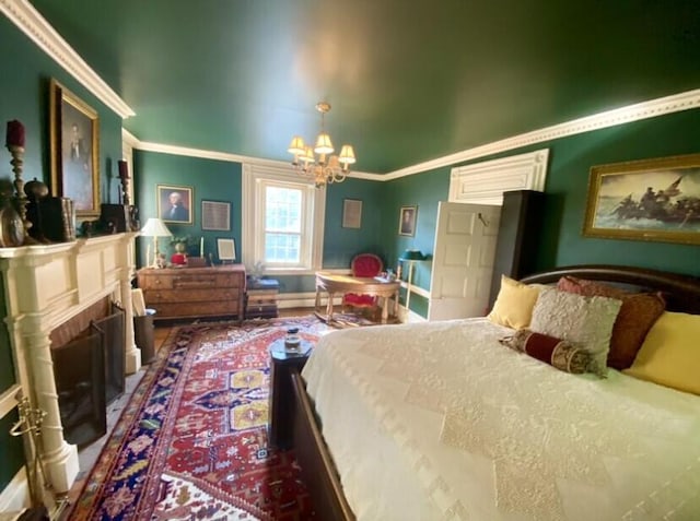 bedroom with crown molding and a notable chandelier