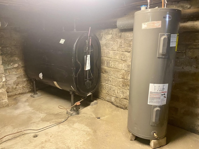 utility room featuring electric water heater