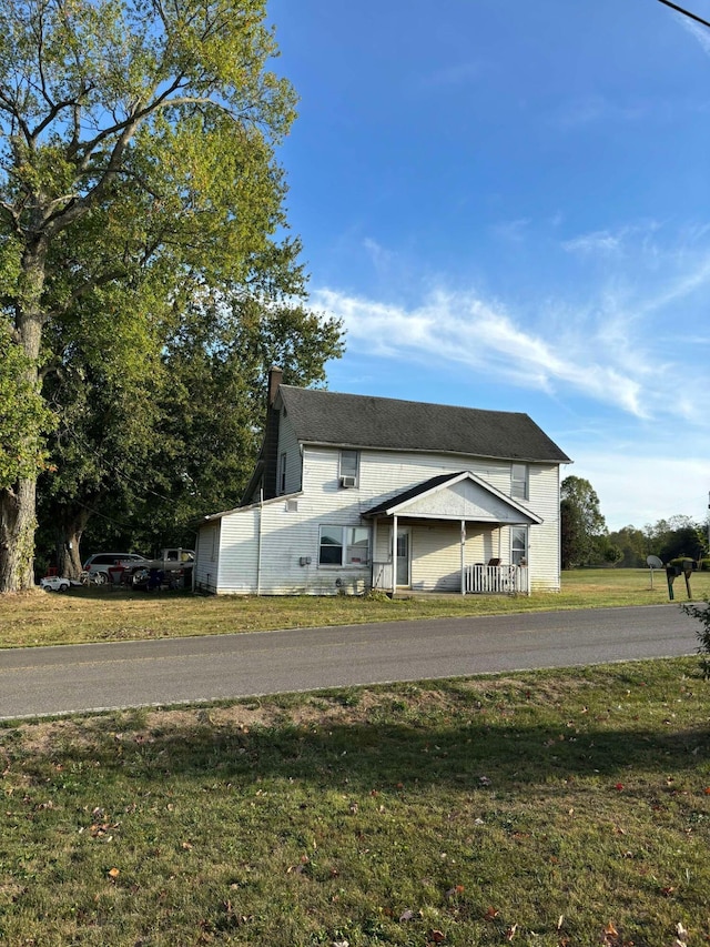 exterior space with a front yard