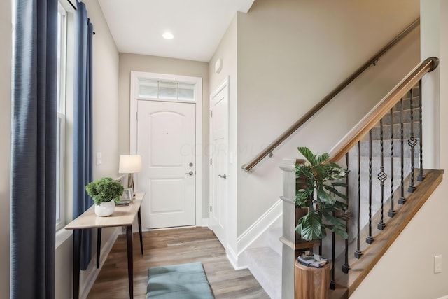 foyer entrance featuring hardwood / wood-style flooring