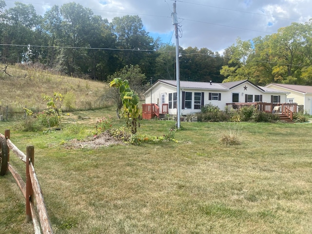 view of yard with a deck