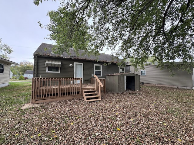 back of house featuring a deck