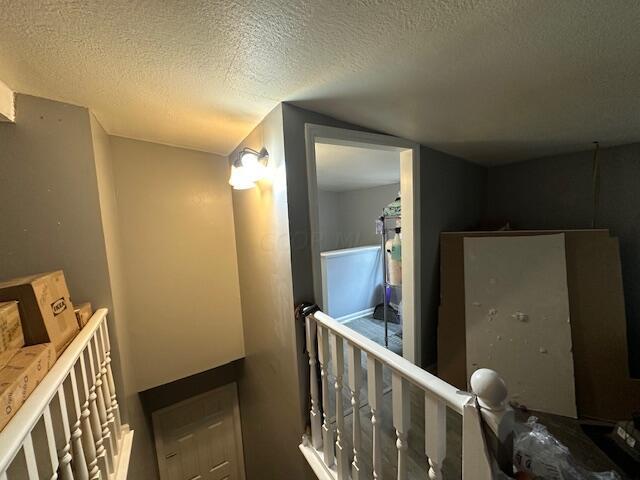 bathroom with a textured ceiling