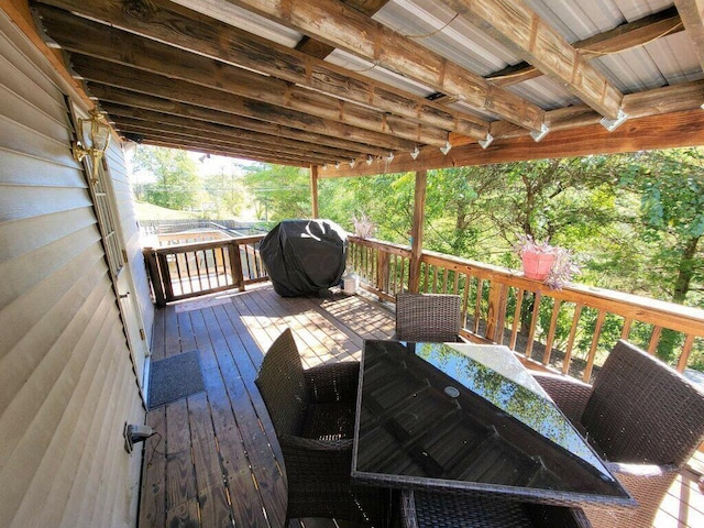 wooden deck with area for grilling