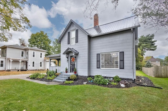 view of front property featuring a front lawn