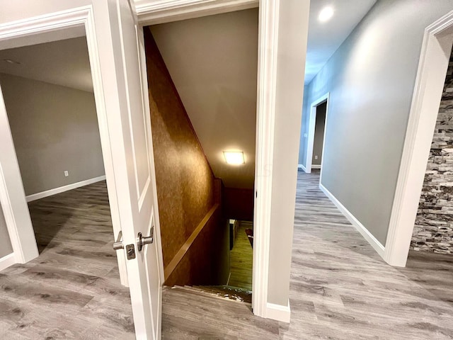 staircase featuring hardwood / wood-style floors