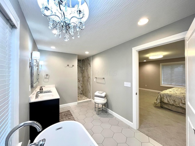 bathroom with shower with separate bathtub, vanity, a textured ceiling, and an inviting chandelier