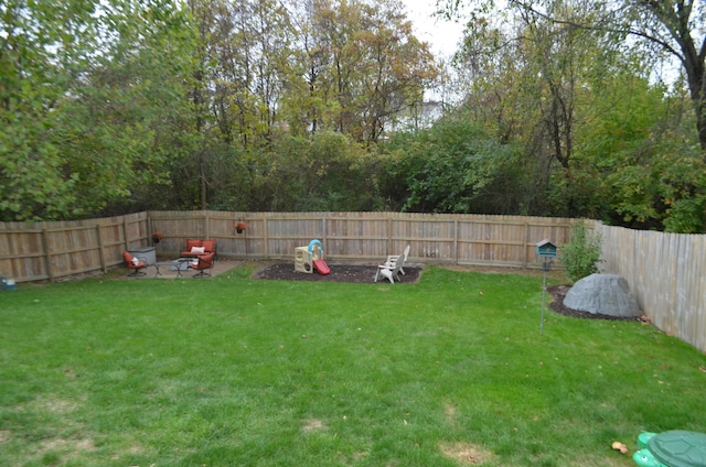 view of yard with a fenced backyard