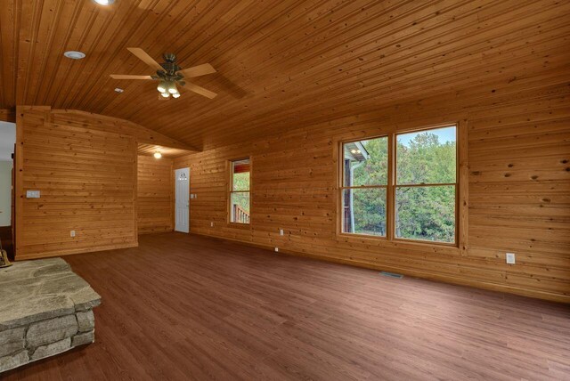 unfurnished living room with hardwood / wood-style floors, vaulted ceiling, ceiling fan, and wooden ceiling