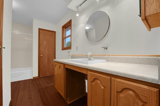 bathroom featuring vanity and wood-type flooring