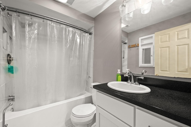 full bathroom featuring vanity, toilet, and shower / bathtub combination with curtain