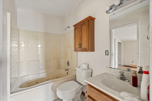 full bathroom featuring vanity, toilet, and tiled shower / bath