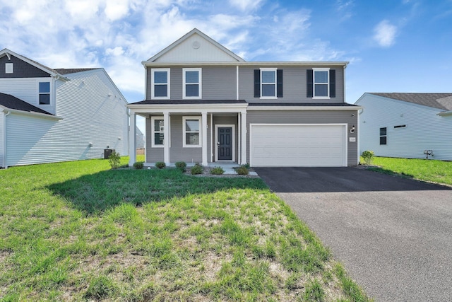 view of property with cooling unit, a garage, and a front lawn