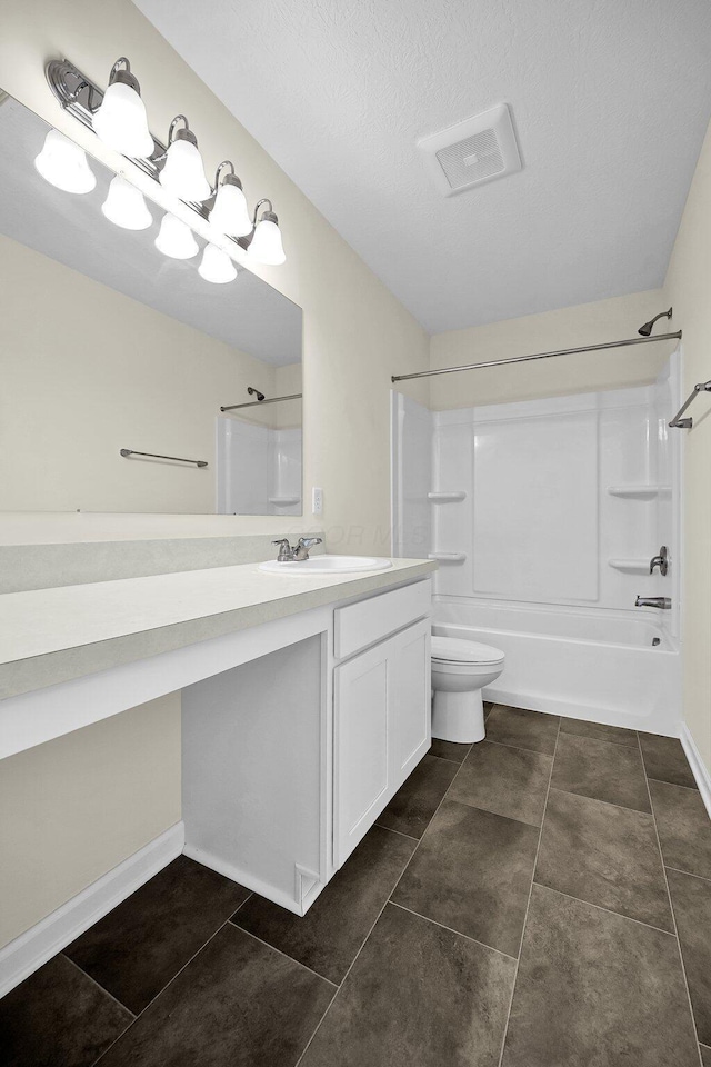 full bathroom with tile patterned flooring, shower / bathing tub combination, vanity, and toilet