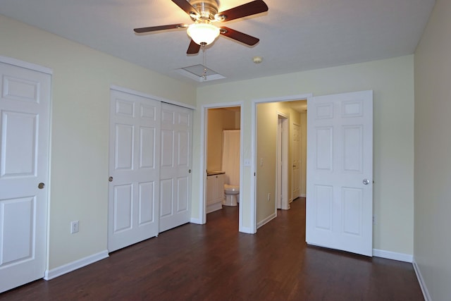 unfurnished bedroom with ceiling fan, dark wood-type flooring, and baseboards