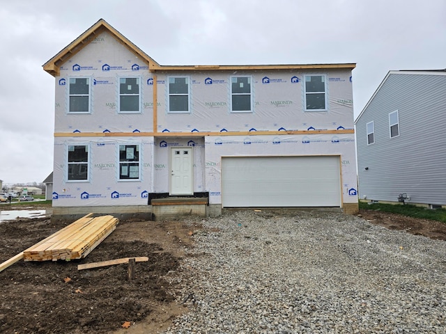 property under construction featuring a garage